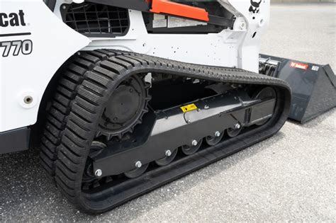 how tight should skid steer tracks be|bobcat skid steer track tension.